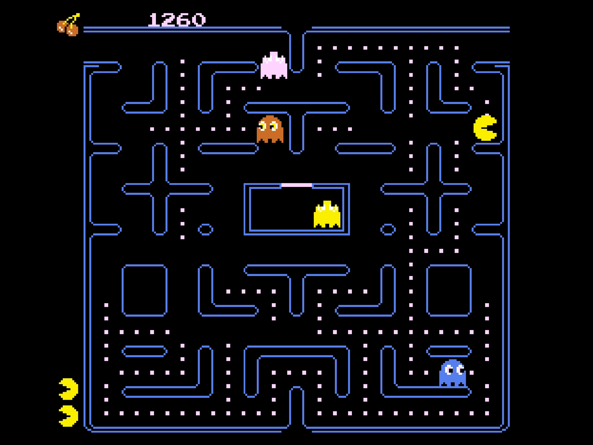 PAC-MAN dodging ghosts in the maze